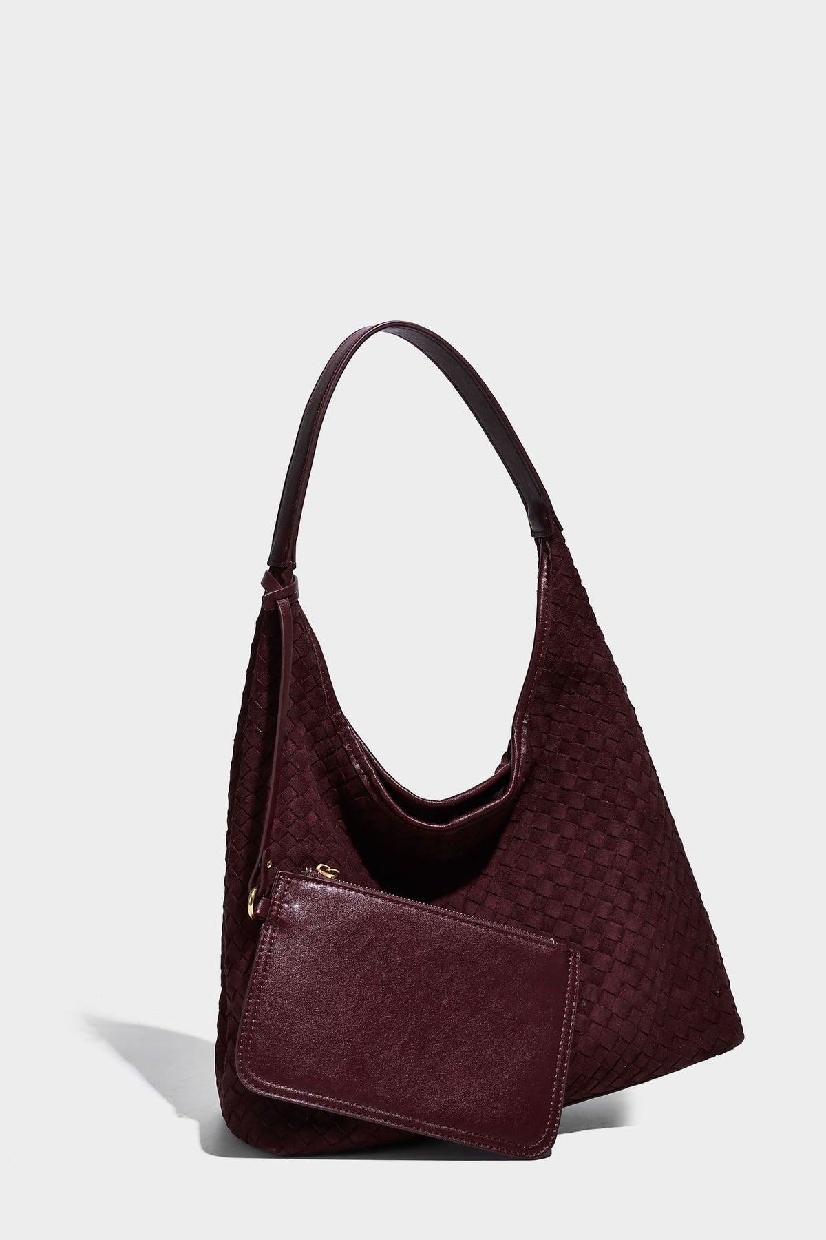 Large slouchy woven hobo tote bag with curved shoulder strap and triangular silhouette, detail view 30