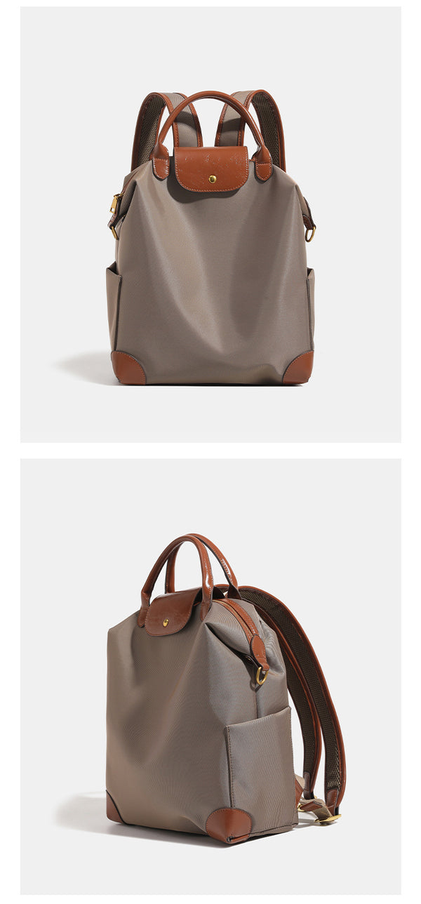 Soft rectangular nylon convertible backpack handbag with leather-look trim, snap-flap closure, top carry handles, padded
