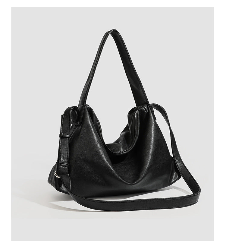 Slouchy leather-look hobo shoulder bag with top zipper and silver-tone hardware, detail view 13