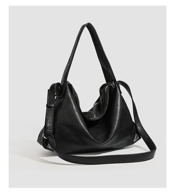 Slouchy leather-look hobo shoulder bag with top zipper and silver-tone hardware, detail view 13