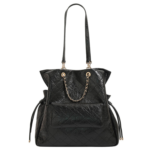 Large quilted leather-look drawstring backpack handbag with gold-tone chain handles and front flap pocket, detail view 5