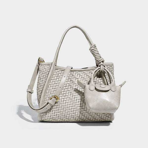 Woven texture open-top tote bag with smooth trim top handles and attached mini drawstring pouch in dark brown, detail view 8