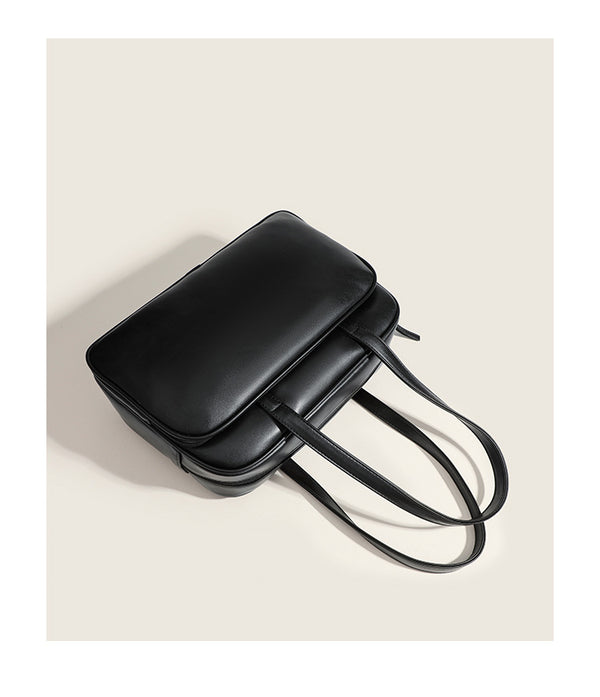 Large structured rectangular leather-look shoulder bag with dual zip compartments and double top handles, detail view 9