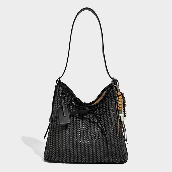 Slouchy open-weave shoulder tote bag with leather-look tan trim, tie-front closure, and long adjustable strap, detail view 3