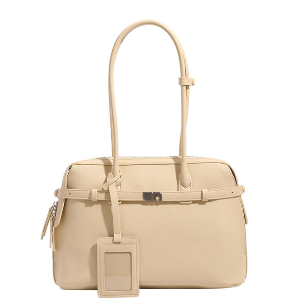 Structured leather-look zip-top tote satchel with twin handles, front turn-lock strap, hanging ID tag, and silver-tone