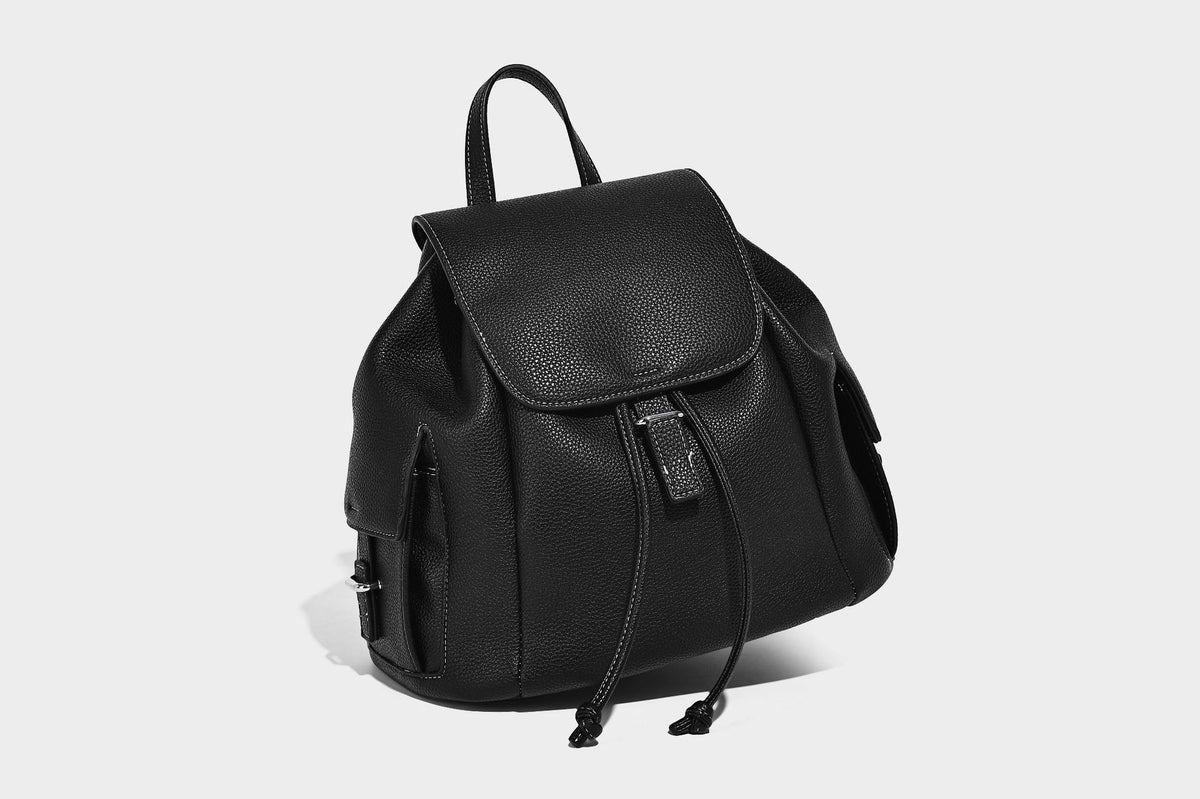 Compact pebbled leather-look flap drawstring backpack handbag with side pockets, top handle, and silver-tone hardware, detail