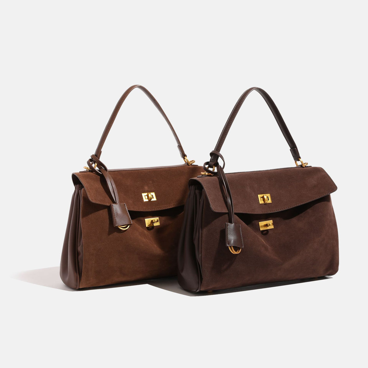 Strukturierte Henkeltasche im Satchel-Stil mit Wildlederoptik in Braun, goldfarbenem Drehverschluss, Tragegriff und abnehmbarem Schulterriemen