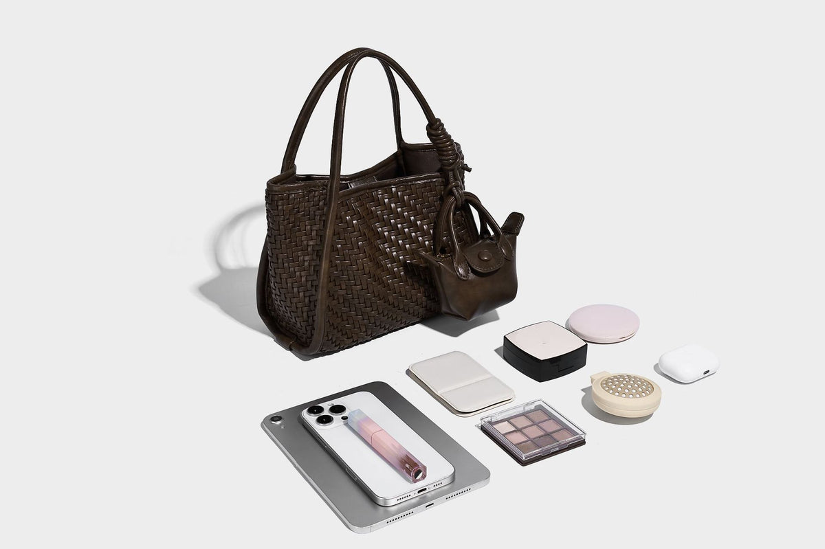 Woven texture open-top tote bag with smooth trim top handles and attached mini drawstring pouch in dark brown, detail view 23