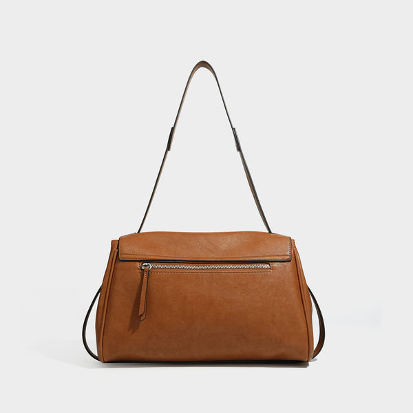 Structured rectangular flap shoulder bag in dark brown leather-look finish with long single strap and layered front panel