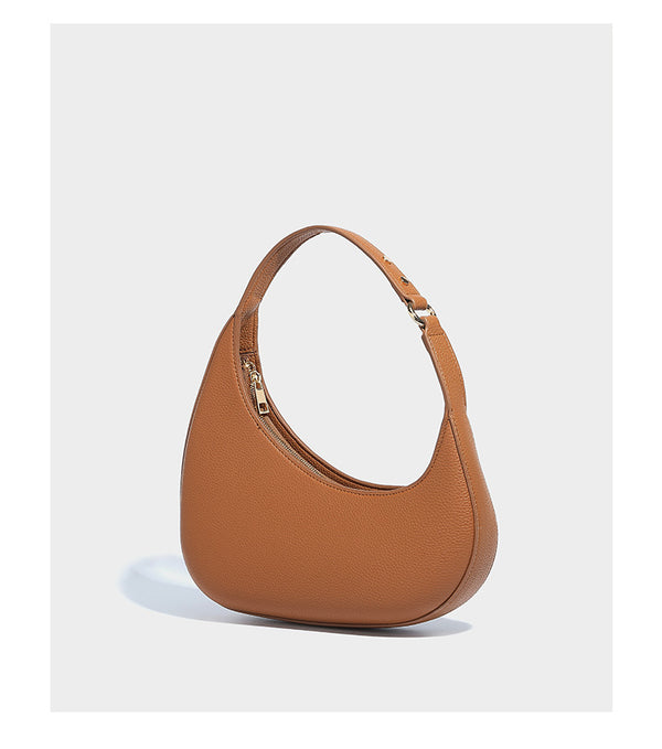 Halbmondförmige Schultertasche mit genarbter Oberfläche, einem einzelnen Schlaufenhenkel und goldfarbenen Reißverschlussdetails, Detailansicht 9