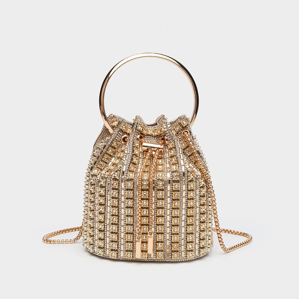 Mini crystal rhinestone bucket bag with circular ring top handle, drawstring closure, and silver chain shoulder strap, detail