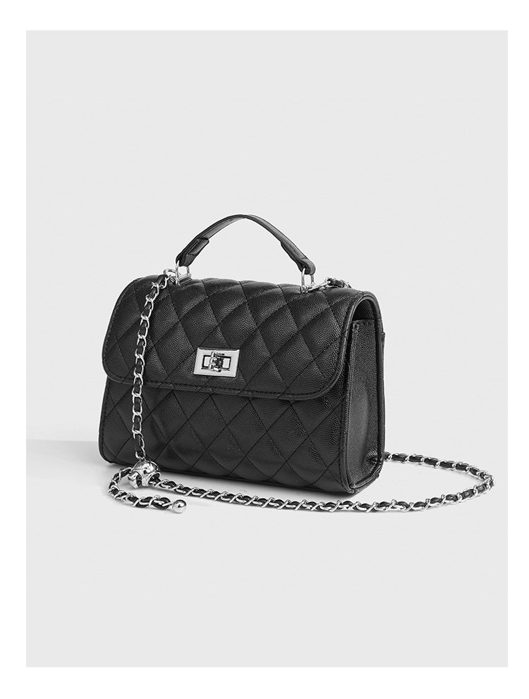 Small structured diamond-quilted flap satchel bag with silver-tone chain strap and turn-lock closure, detail view 18
