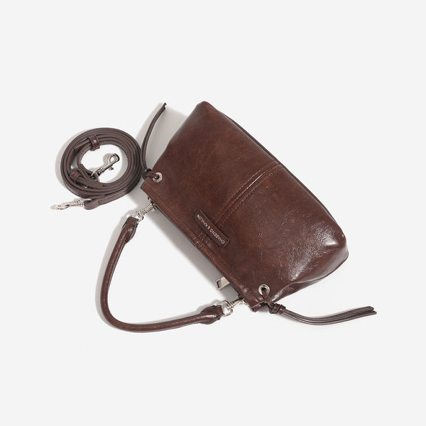 Compact retro mini shoulder bag with crinkled leather-look finish, drawstring side detail, and silver-tone hardware, detail