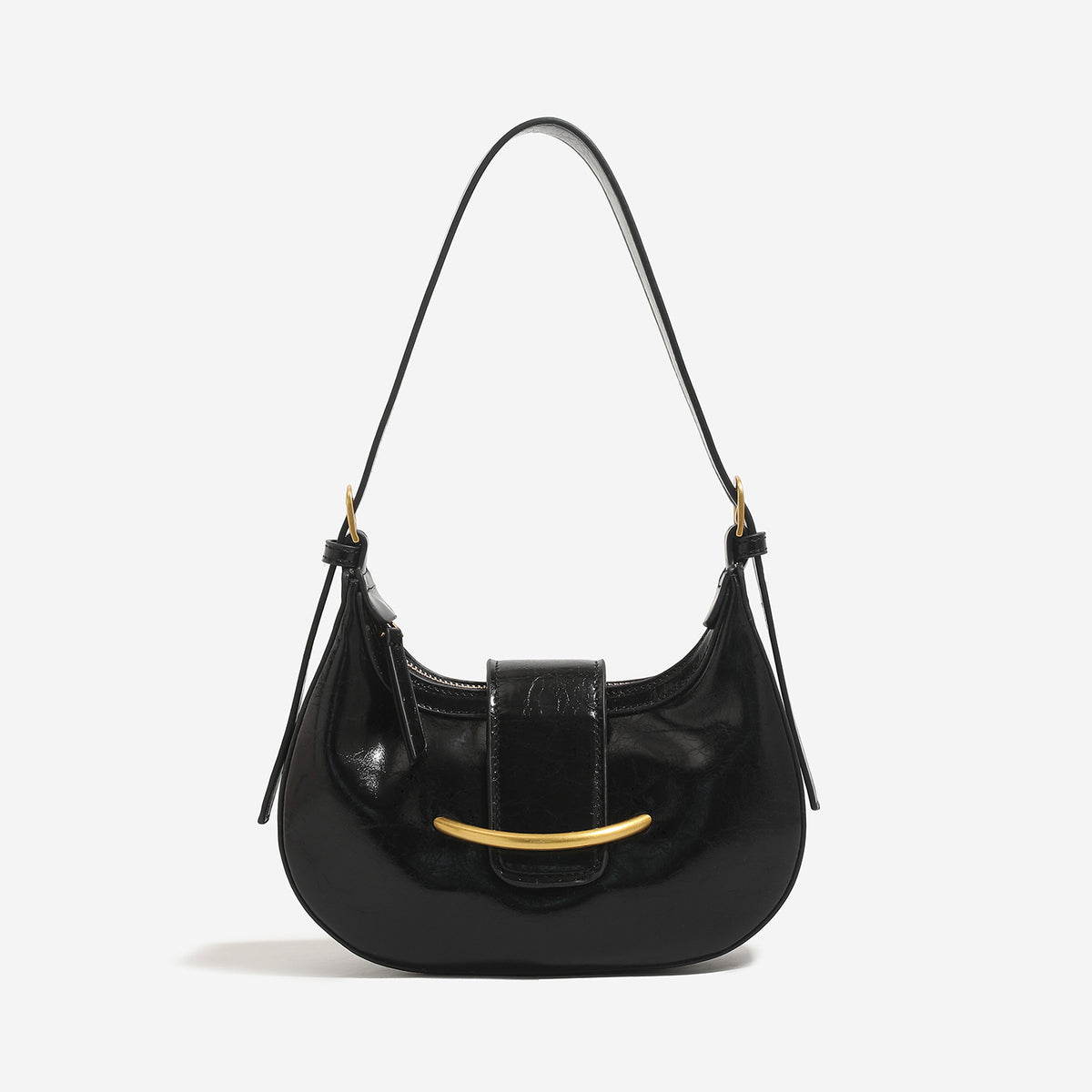 Compact crescent hobo shoulder bag with glossy synthetic finish, curved gold-tone front bar hardware, zip-top closure, and