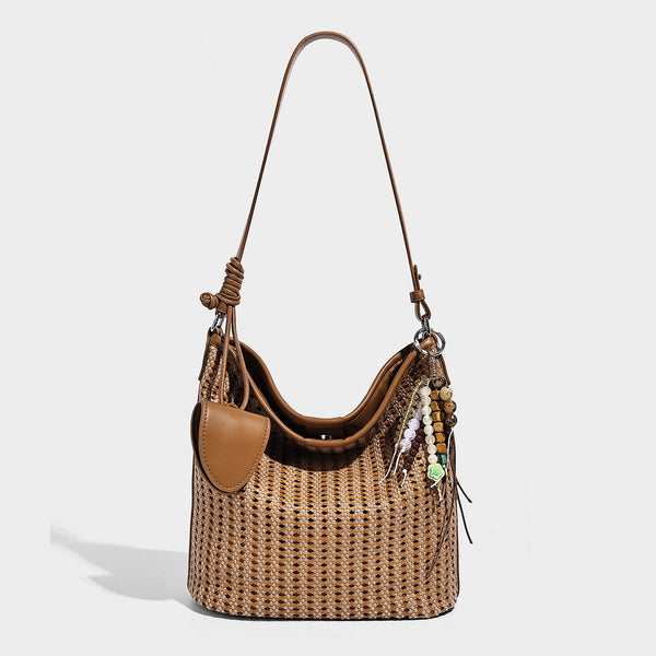 Slouchy open-weave hobo shoulder bag with leather-look trim, beaded tassel charm, and adjustable strap, detail view 9