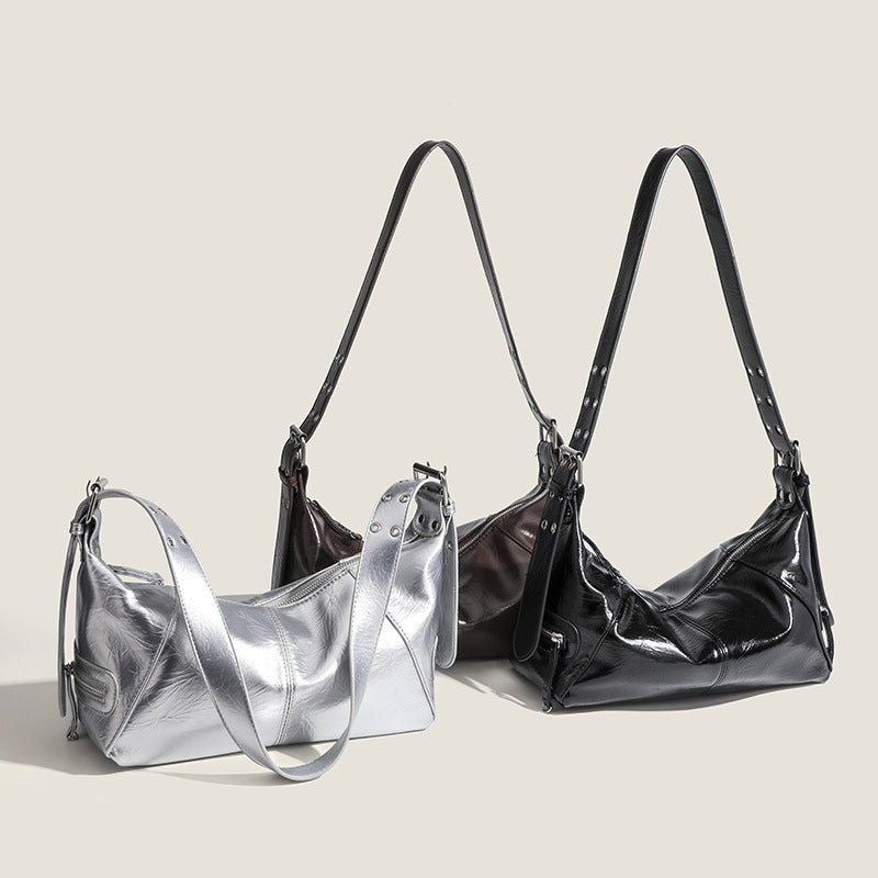 Glossy crinkled mini hobo shoulder bag with studded adjustable strap and silver-tone hardware, detail view 2