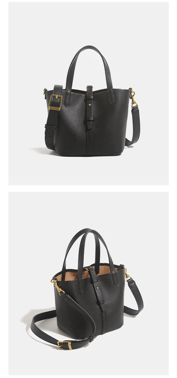 Small structured pebbled leather-look bucket tote bag with dual top handles and silver-tone hardware, detail view 10