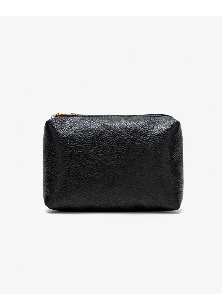 Large slouchy hobo shoulder bag in pebbled matte leather-look finish with single flat strap, detail view 13