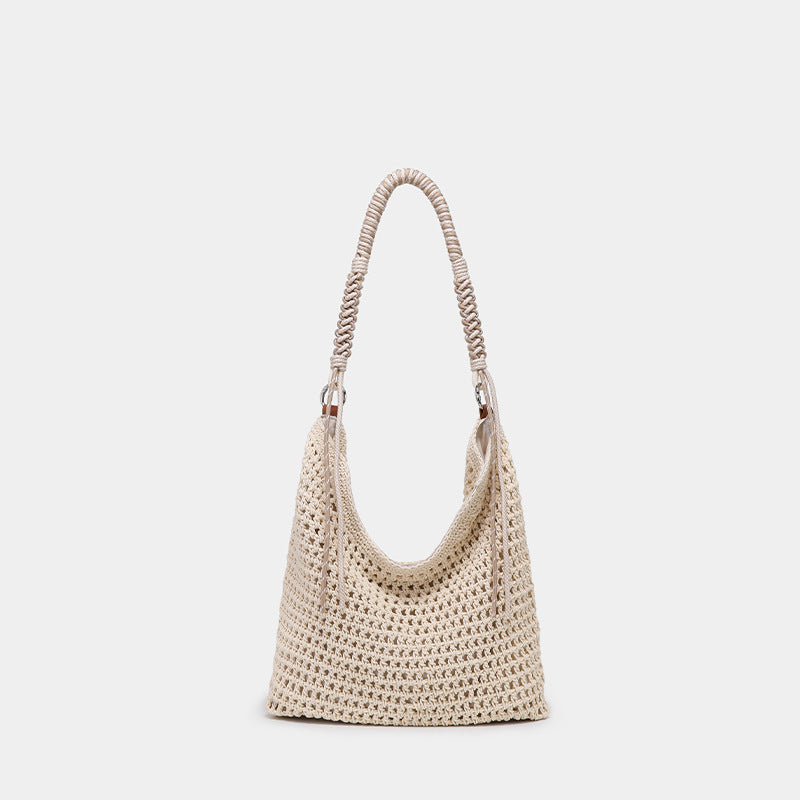 Große gewebte Hobo-Schultertasche in Creme mit geflochtenem Kordelriemen und silberfarbenen Ringdetails, Detailansicht 6