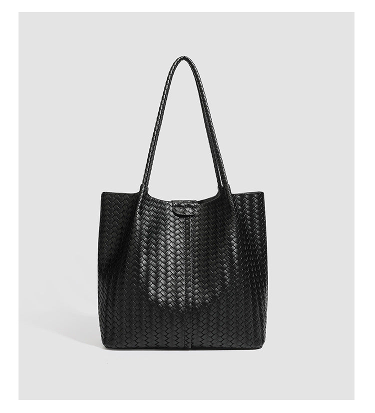 Large black basket-weave leather-look tote bag with long braided shoulder straps and matching woven zip pouch, detail view 12