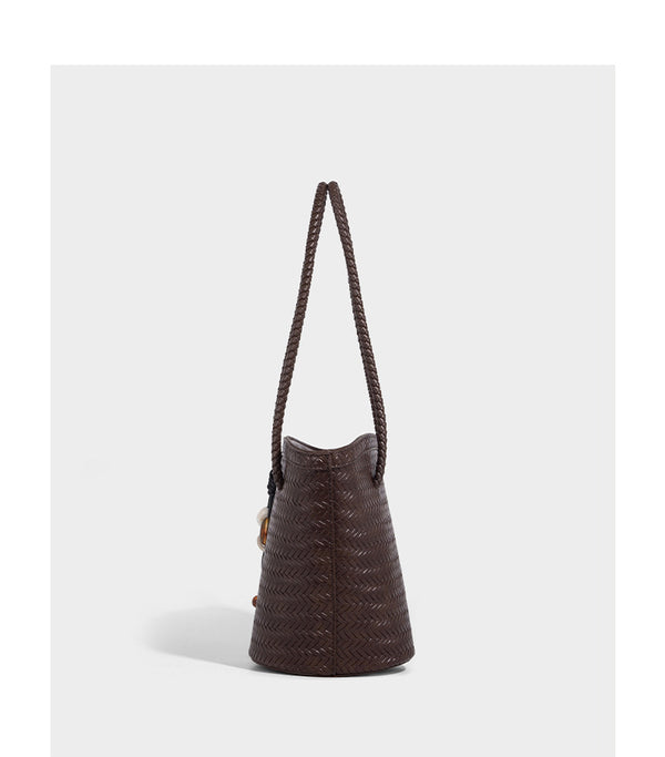Chevron-woven bucket tote bag with braided shoulder straps and matching drawstring pouch, detail view 18