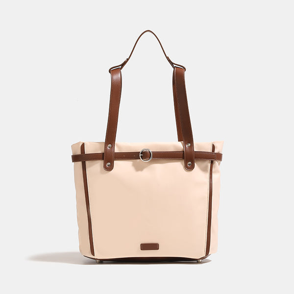 Große wandelbare Tote-Bag in Creme mit Riemen in Lederoptik und Ringschnallendetail, Detailansicht 7