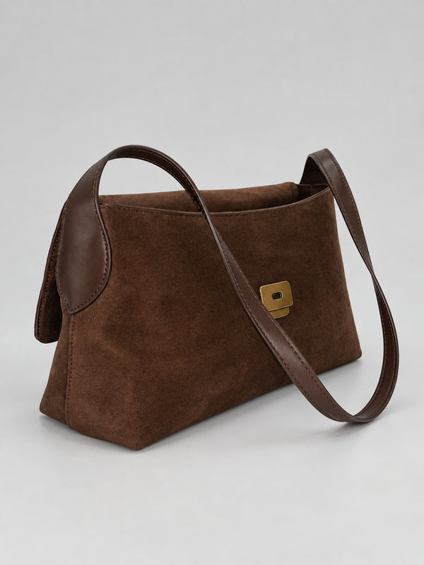 Rectangular matte suede-finish flap shoulder bag with slim dark strap and gold-tone turn-lock hardware, detail view 18