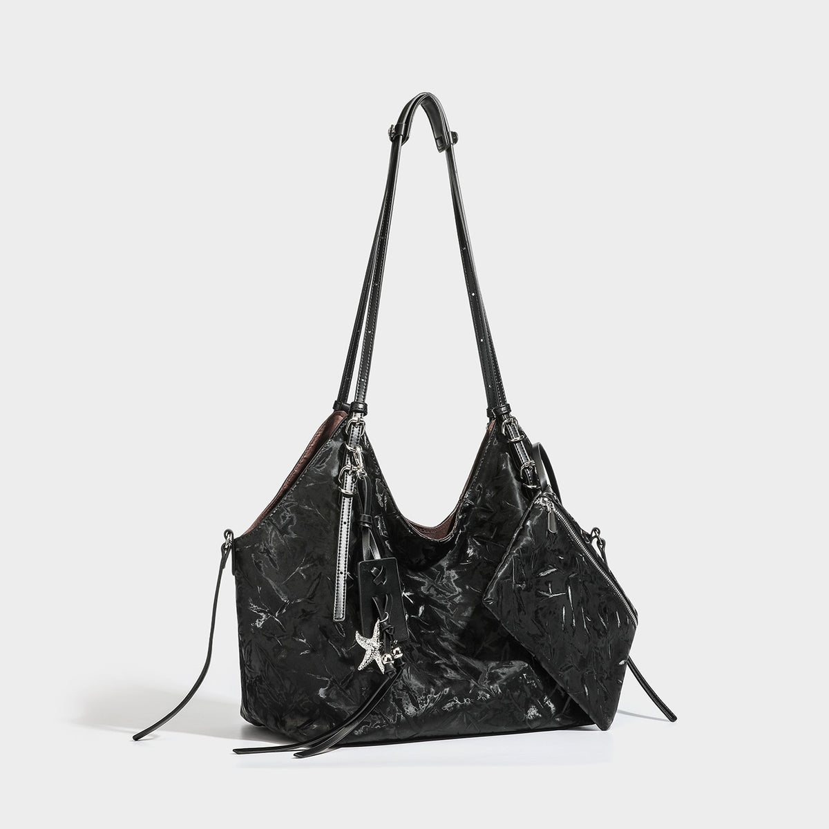 Slouchy crinkle-finish shoulder tote bag with silver hardware and attached zip pouch, detail view 4