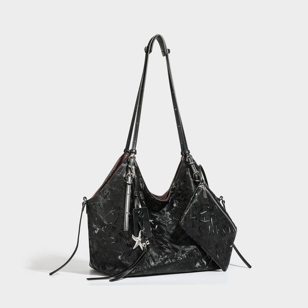 Slouchy crinkle-finish shoulder tote bag with silver hardware and attached zip pouch, detail view 4