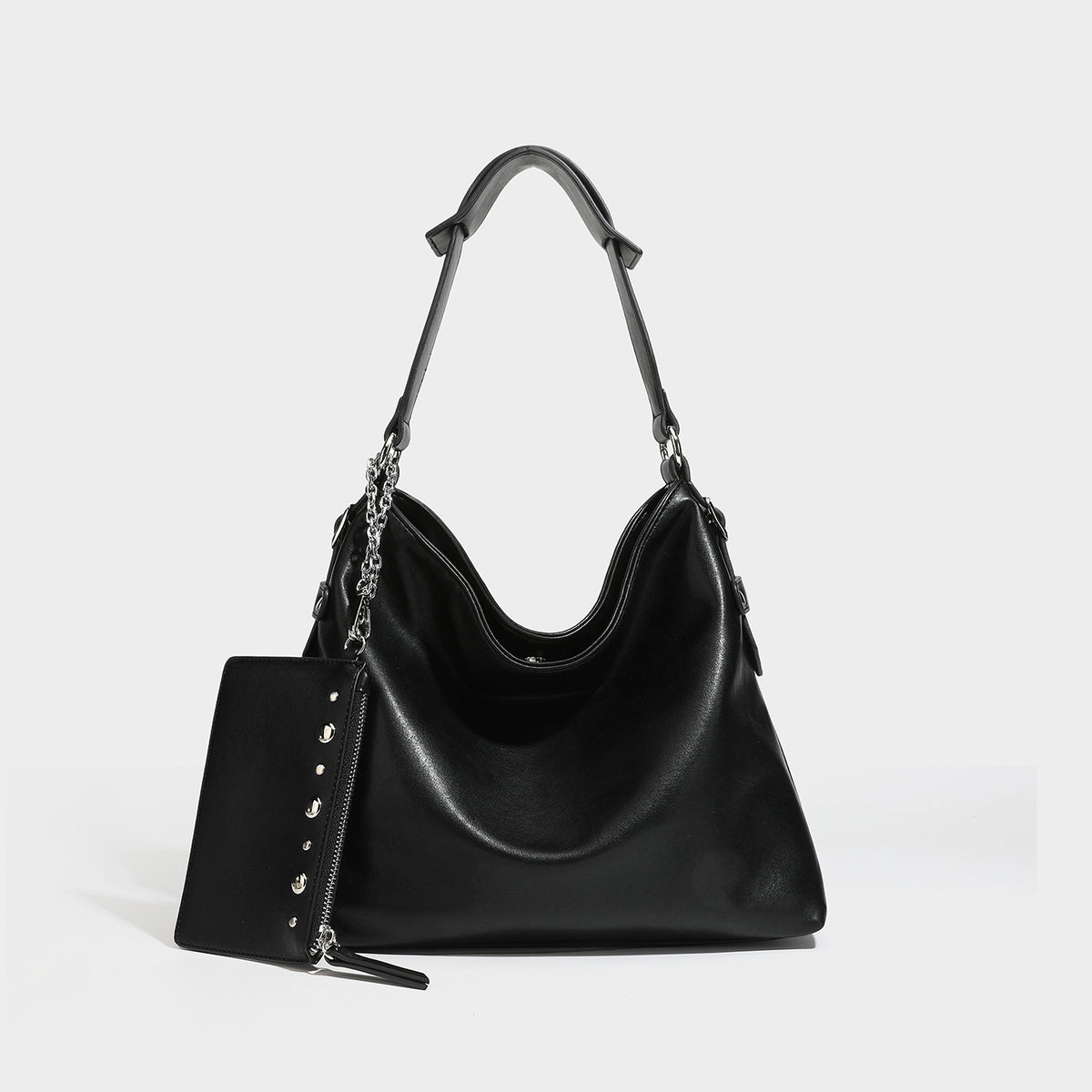 Large slouchy hobo shoulder bag in dark brown with smooth leather-look finish, adjustable strap, and silver-tone hardware