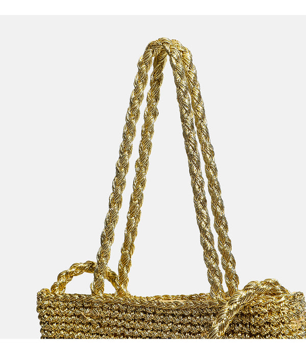 Small soft rectangular metallic crochet-weave shoulder bag with braided top handle and long crossbody strap, detail view 12