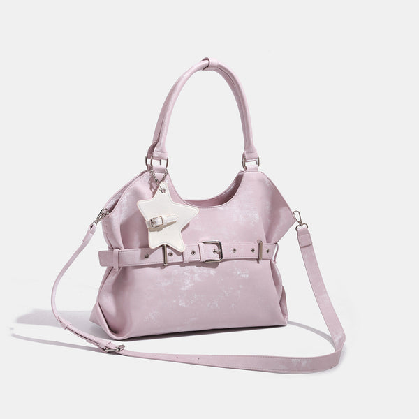 Large soft hobo shoulder bag with glossy textured finish, decorative belt buckle, star charm, and silver-tone hardware