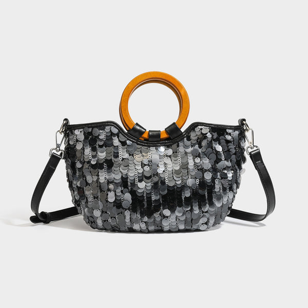Small sequin half-moon handbag with circular wood-look ring handles and detachable leather-look shoulder strap, detail view 4