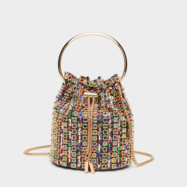 Mini crystal rhinestone bucket bag with circular ring top handle, drawstring closure, and silver chain shoulder strap, detail