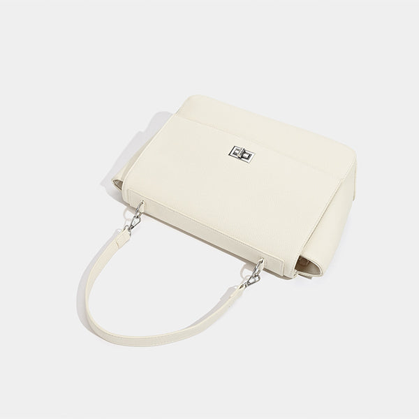 Large structured pebbled-finish flap shoulder bag with silver turn-lock closure and adjustable strap, detail view 4
