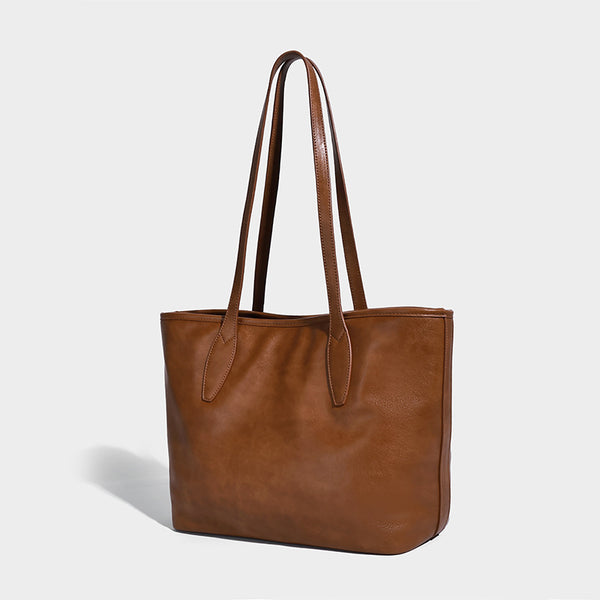 Große strukturierte Tote-Bag in Lederoptik mit zwei Schulterriemen und Metallanhänger-Beschlägen, Detailansicht 8