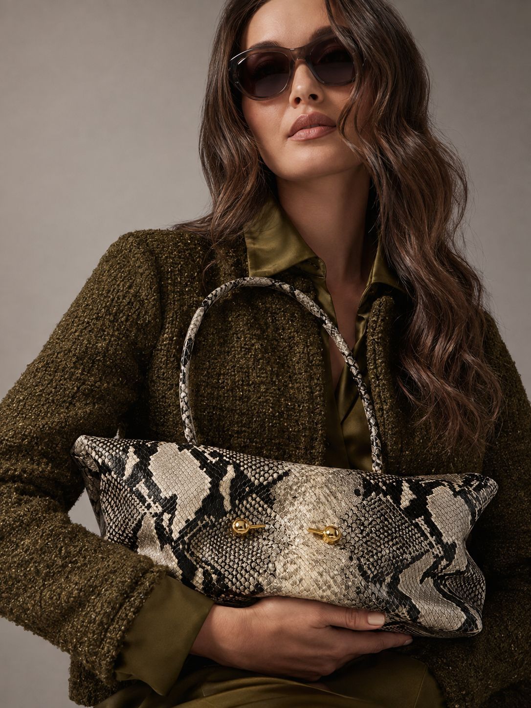 Wide embossed-texture shoulder tote bag with single loop handle and gold-tone toggle hardware, detail view 15