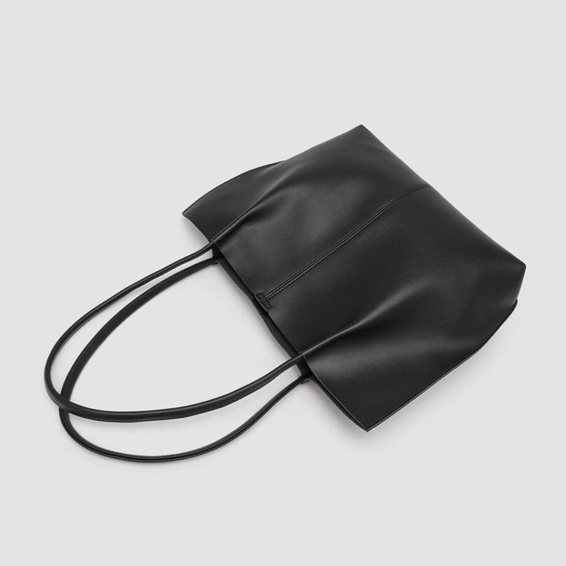 Large slouchy matte leather-look tote bag with double shoulder straps and centre seam detail, detail view 3
