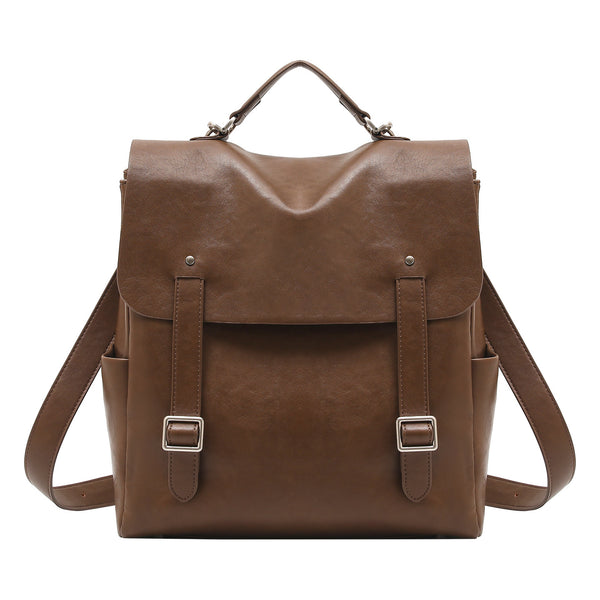 Structured flap backpack handbag in smooth leather-look finish with buckle front pocket, top handle, and silver-tone