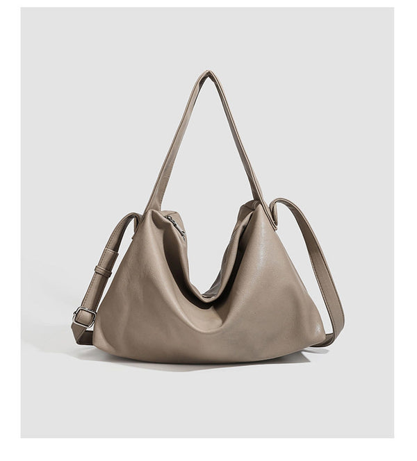 Slouchy leather-look hobo shoulder bag with top zipper and silver-tone hardware, detail view 9