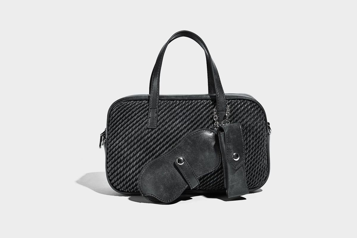 Structured woven-texture front top-handle handbag with zip closure, dual handles, detachable shoulder strap, and matching