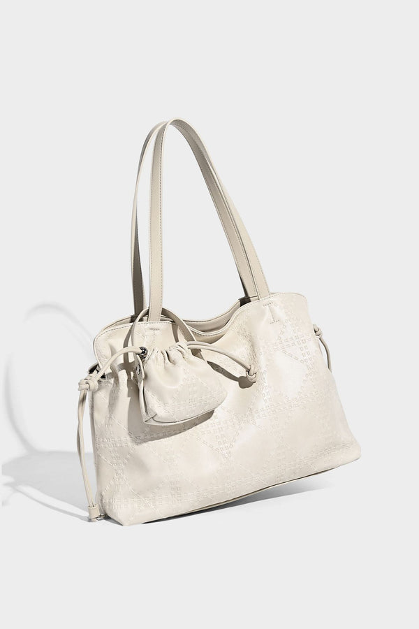 Große Tote-Schultertasche aus geprägtem Lederimitat in Elfenbein-Creme mit zwei langen Riemen, seitlicher Kordelraffung und abnehmbarem