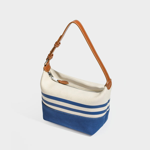 Schultertasche aus cremefarbenem und blau gestreiftem Canvas mit Riemen in hellbrauner Lederoptik und Reißverschluss in Silberoptik, Detailansicht 3