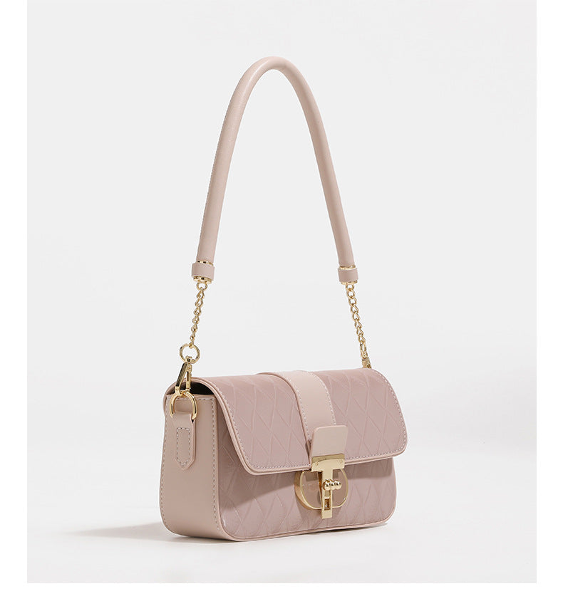 Compact rectangular quilted flap crossbody bag with gold-tone turn-lock closure and chain strap, detail view 11