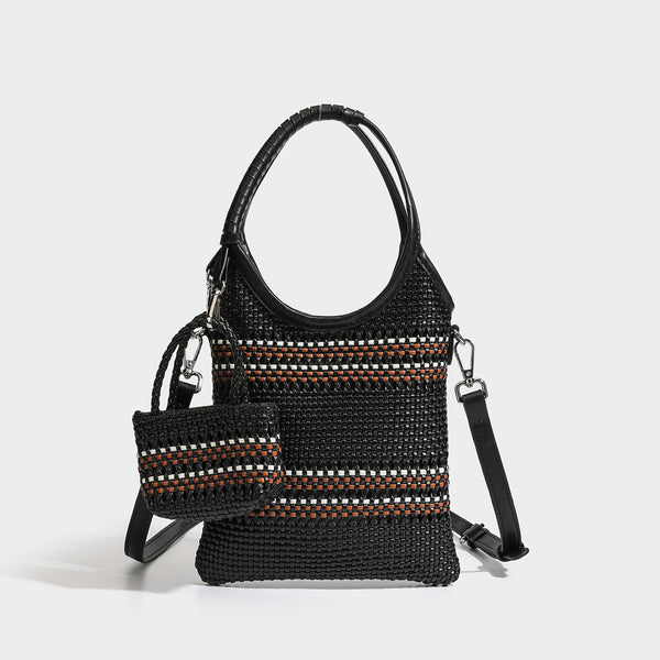 Color-block woven tote bag with rounded leather-look handles, detachable crossbody strap, and matching mini clip-on pouch in