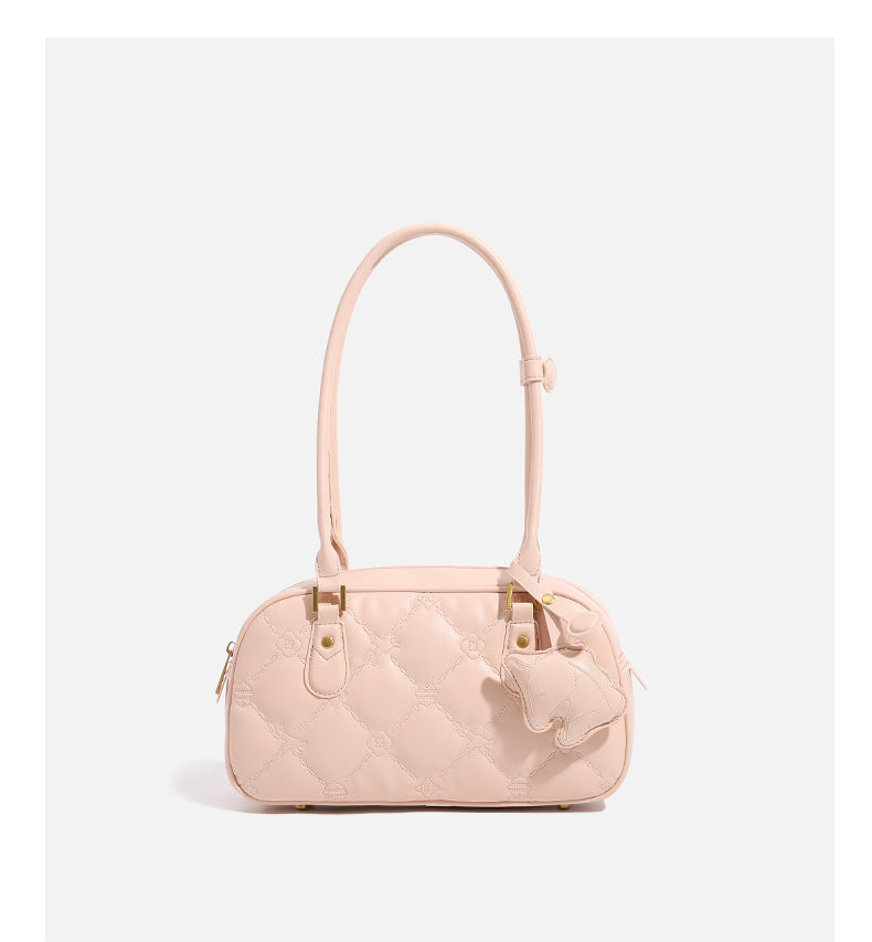 Small structured quilted leather-look zip shoulder bag with gold-tone hardware and adjustable strap, detail view 10