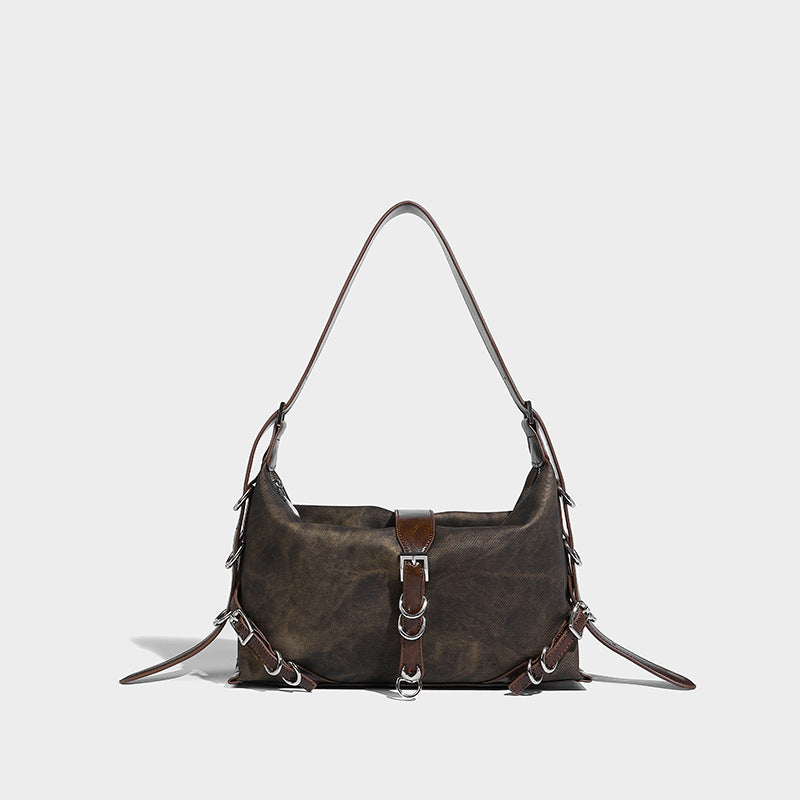 Slouchy hobo shoulder bag with distressed finish, silver-tone ring and buckle hardware, and adjustable strap, front view