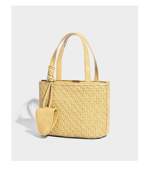 Kleine, formstabile Tote-Bag in gewebter Lederoptik mit geknoteten Henkeln, abnehmbarem Schulterriemen und einem hängenden Mini-Täschchen an der Vorderseite