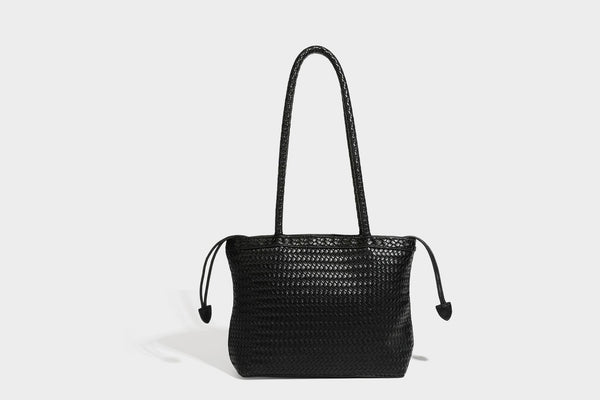 Structured woven leather-look tote bag in dark brown with long shoulder straps, side drawstring ties, and gold filigree