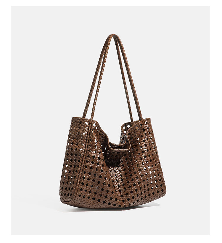 Slouchy open-lattice woven shoulder tote bag with long braided straps and matching zip pouch, detail view 11